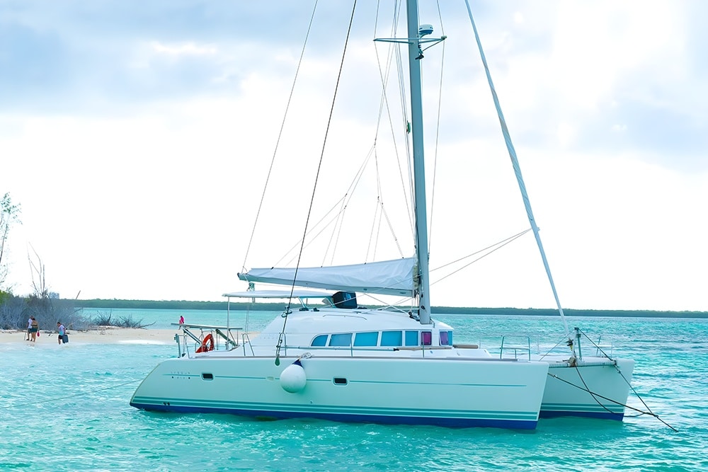 Luxurious catamaran anchored in turquoise waters