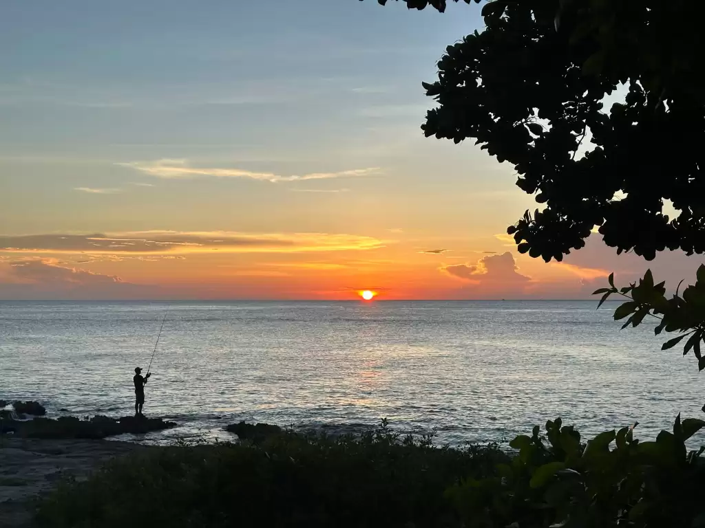Calm bay in Cozumel during sunset with empty beaches