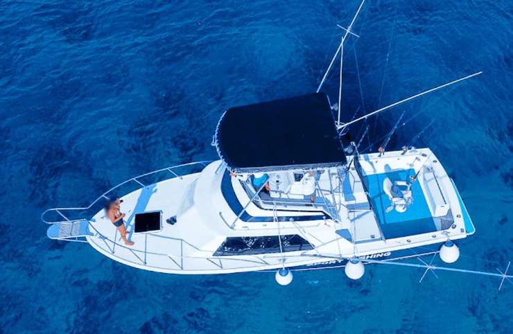 31 ft Cummins sportfisher Cozumel deep sea fishing charter